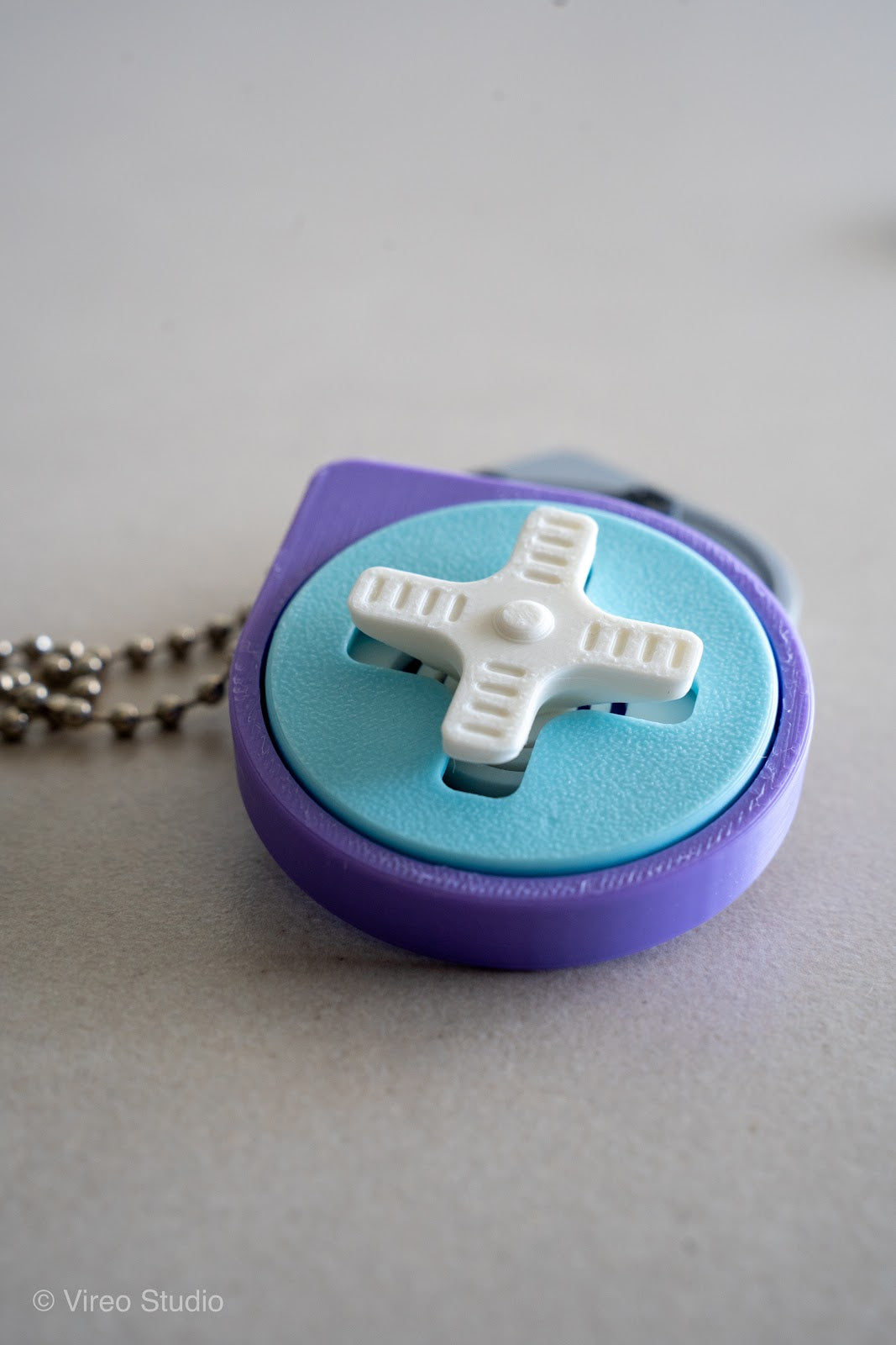 Mini Retro Snap – Fidget Keychain