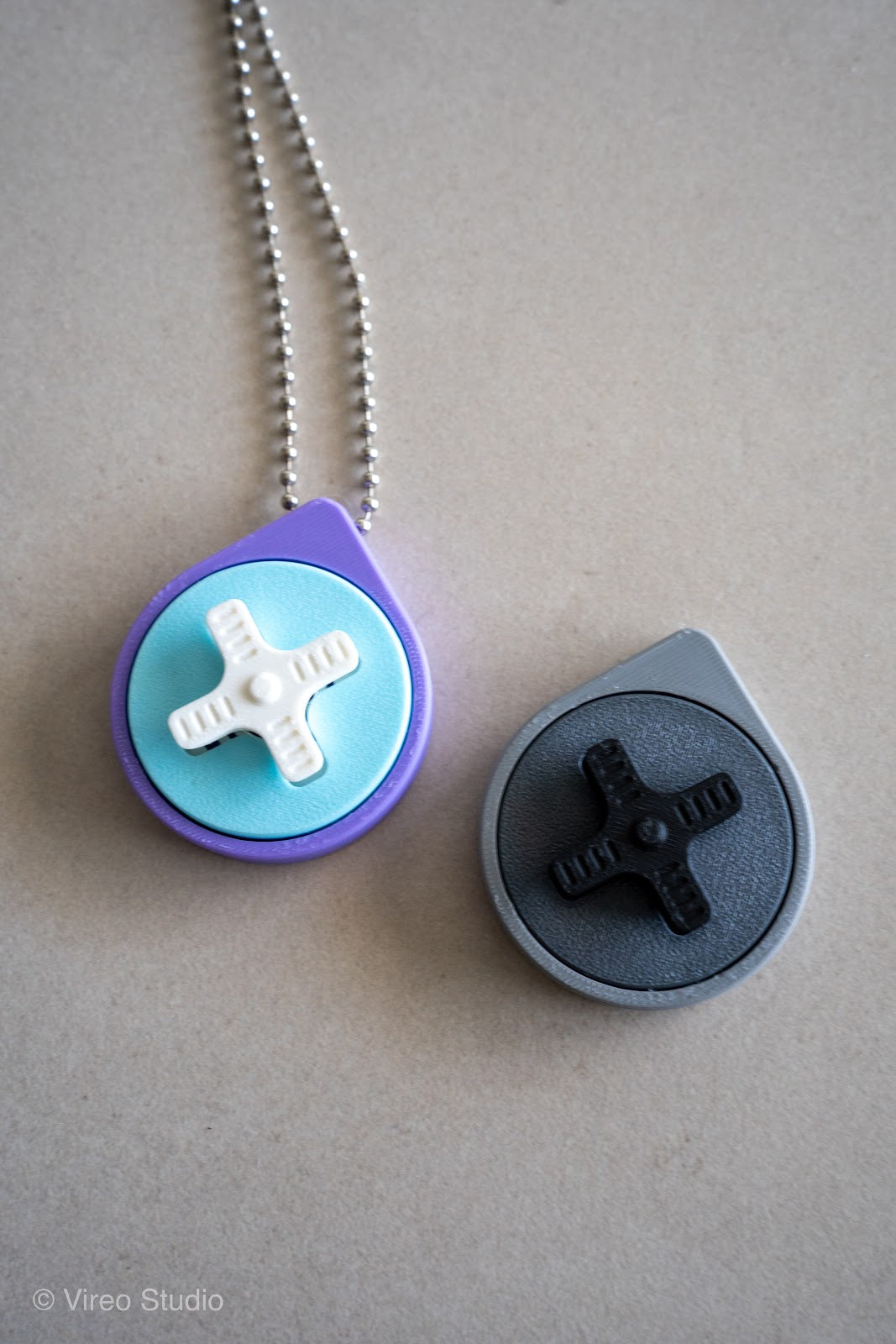 Mini Retro Snap – Fidget Keychain