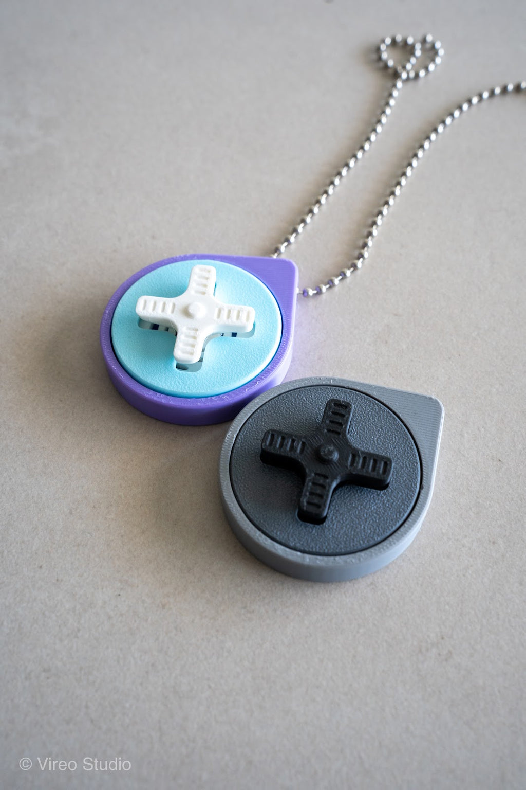 Mini Retro Snap – Fidget Keychain