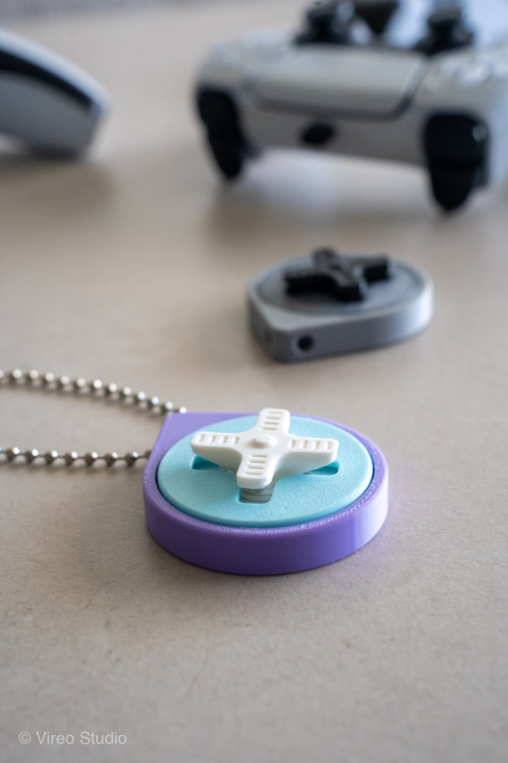 Mini Retro Snap – Fidget Keychain