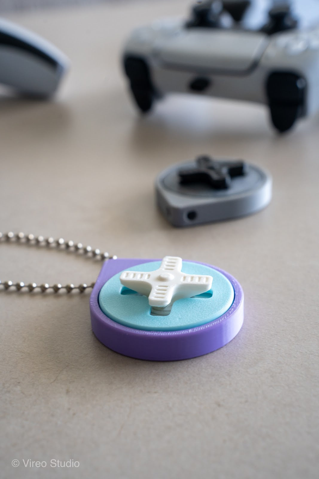 Mini Retro Snap – Fidget Keychain