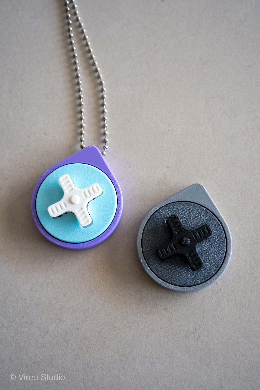 Mini Retro Snap – Fidget Keychain